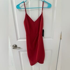 New with tags Lulus dress. Color: rust red